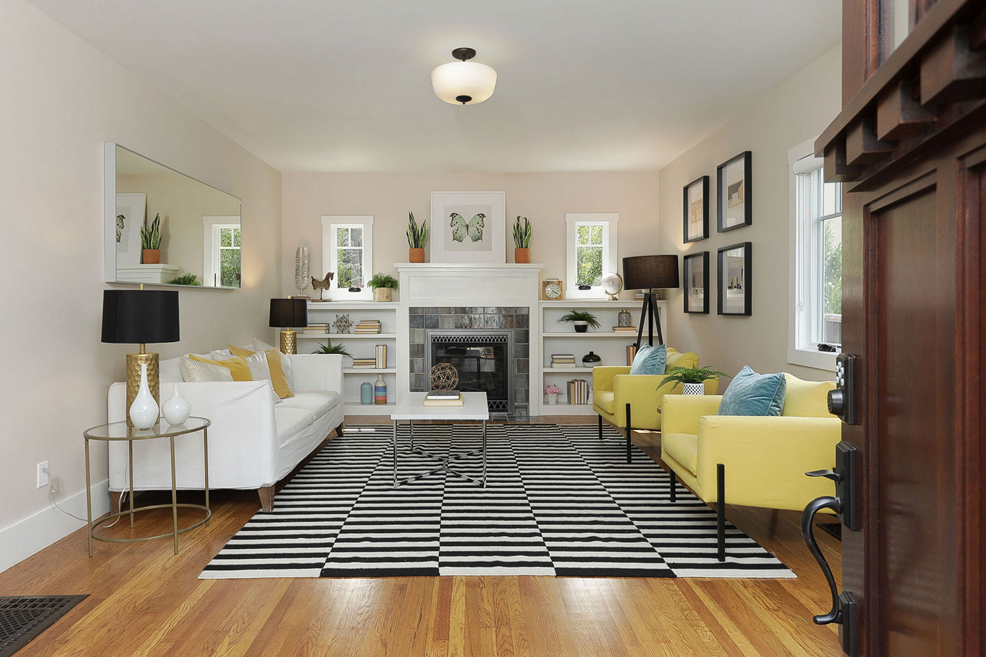 The image depicts a modern living room with a black and white checkered rug, wooden flooring, and various pieces of furniture including a sofa, chairs, and a television stand.